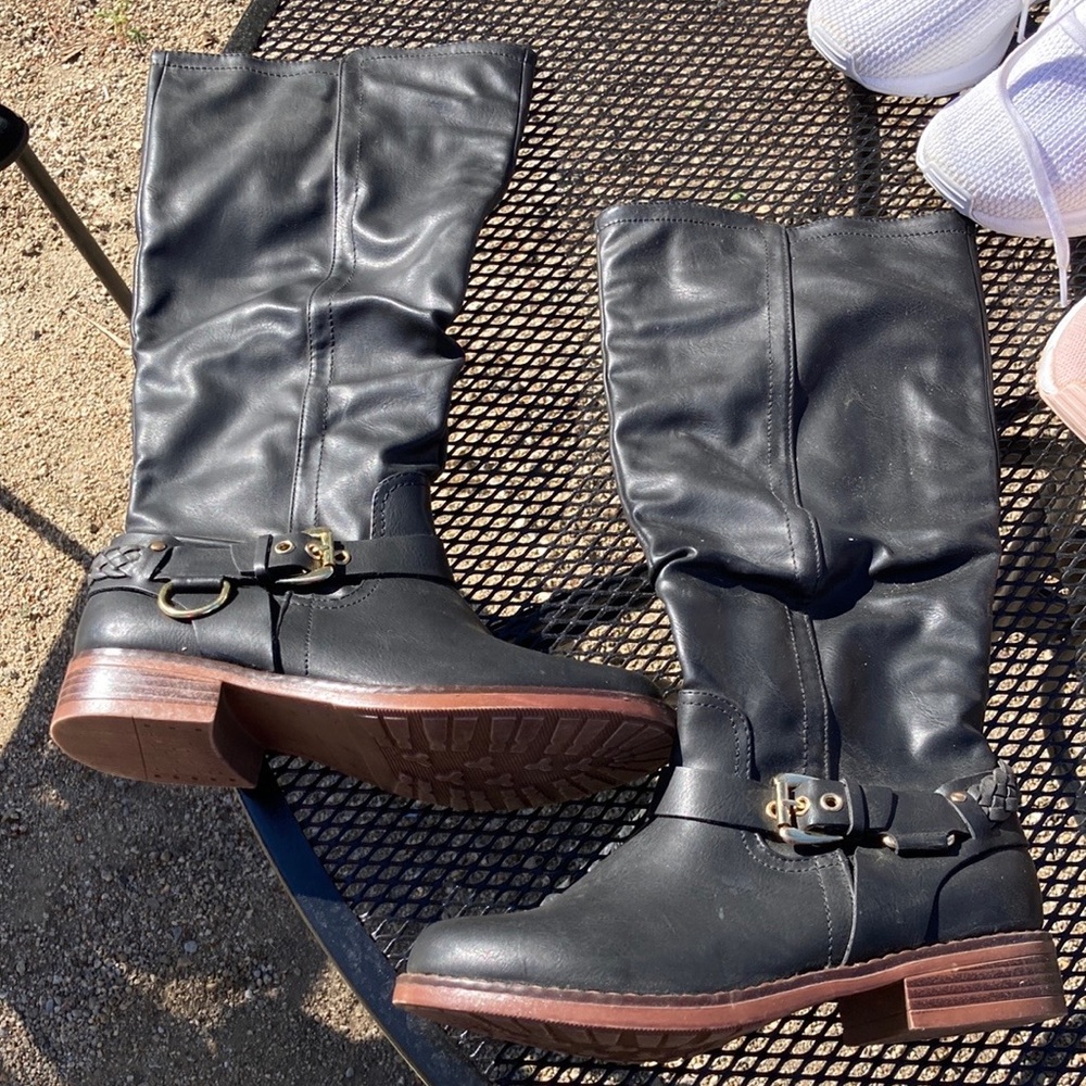 Black long boots.